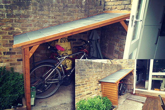 Sencillo tejado que mantiene a salvo las bicicletas de la pertinaz lluvia londinense. La cubierta está realizada con pizarra negra y la estructura de todo el canopi es de pino con acabado en lasur.